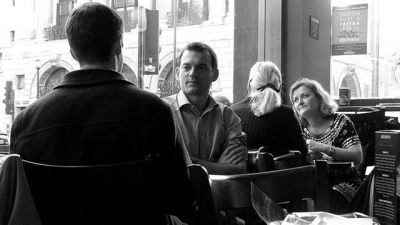 People talking in a cafe (Flickr)