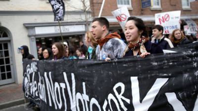 Students protest the Keystone XL pipeline in a march in Washington, DC, in 2014.